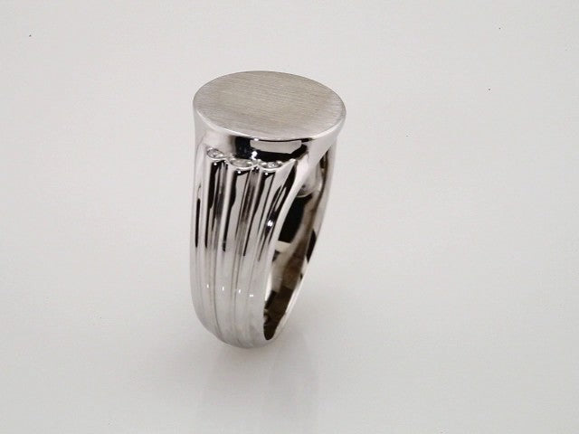 Platinum .07 CTW Natural Diamond 14.5x13 mm Oval Signet Ring